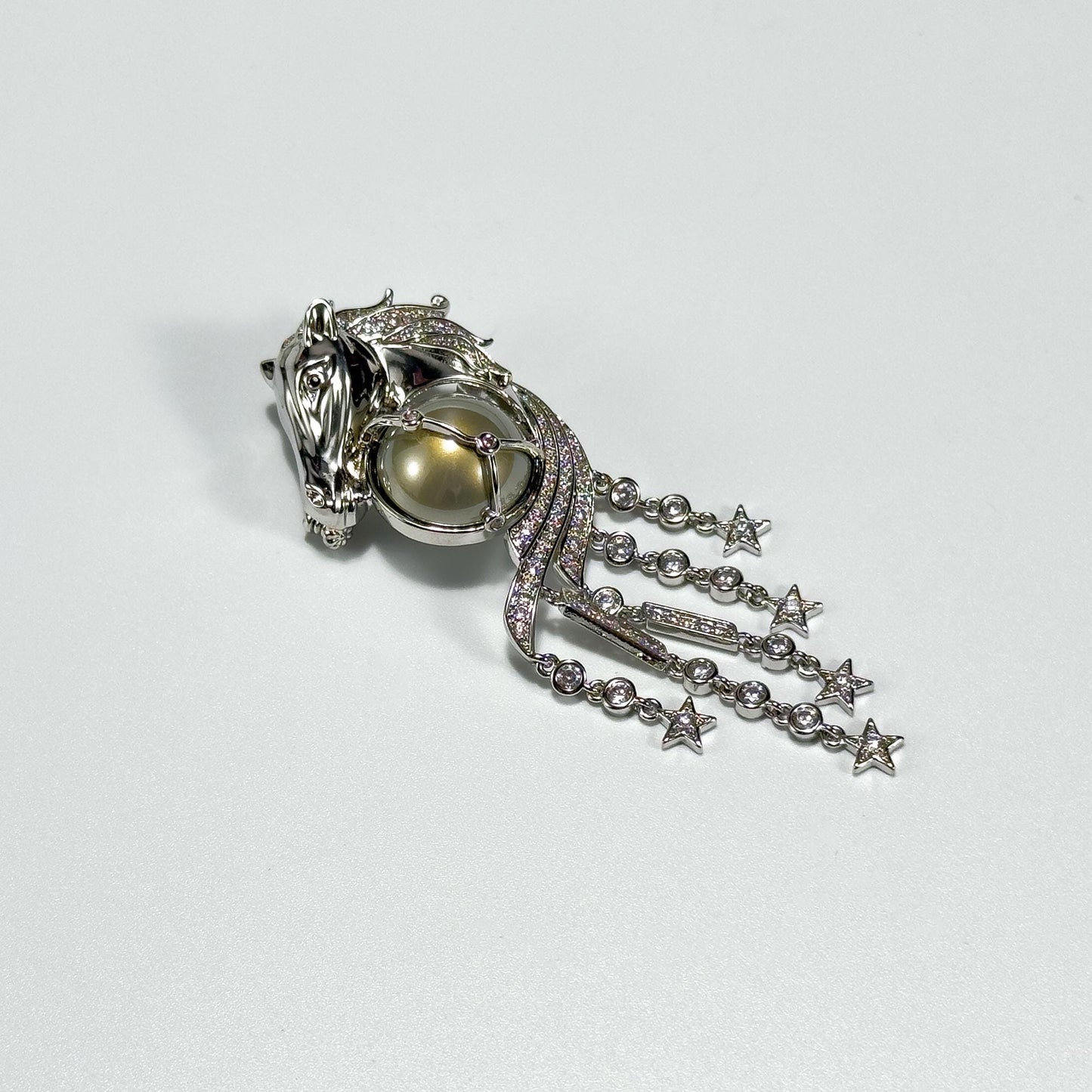 Stylish Horse Head Brooch with Sophisticated Tassel Details