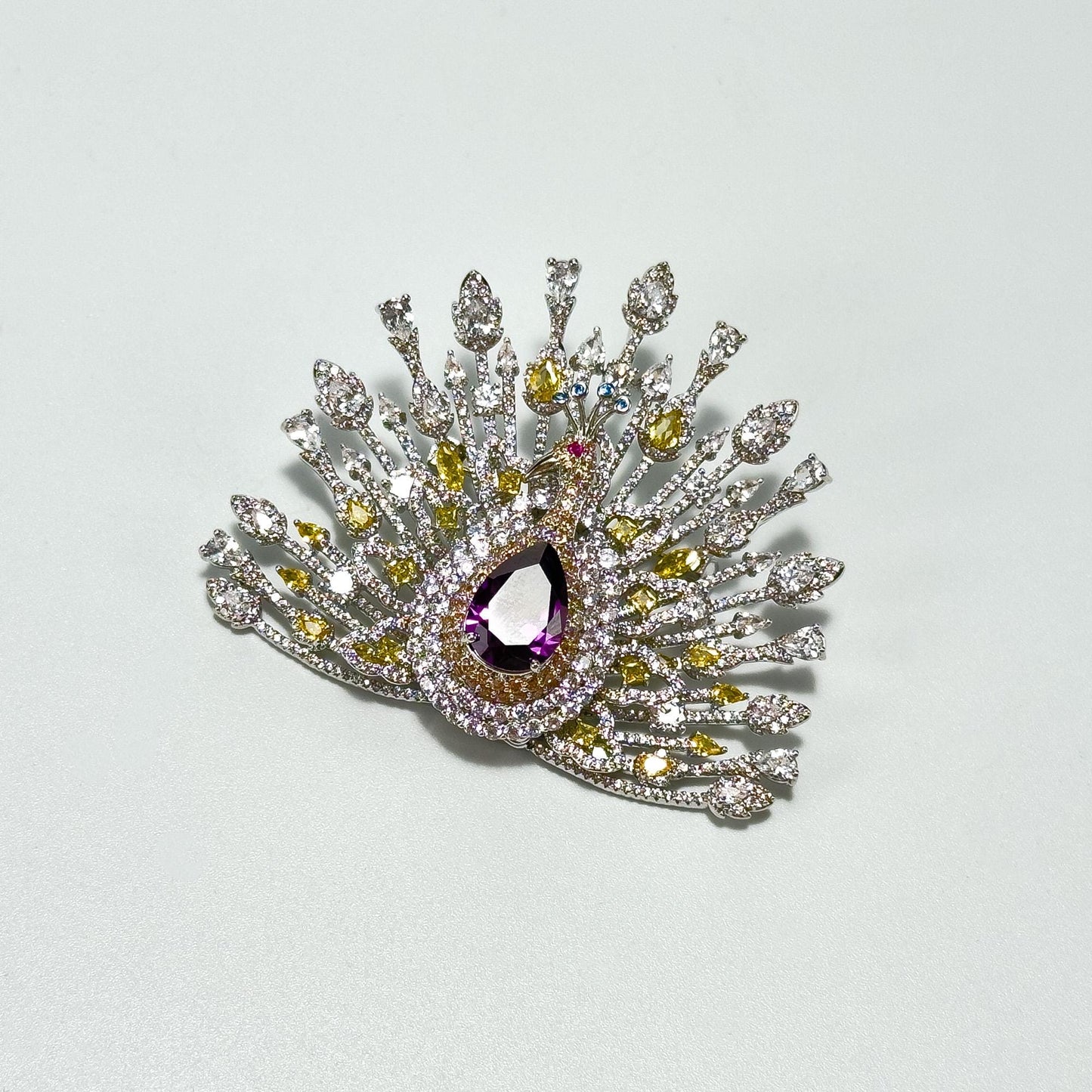 Elegant Peacock Brooch with Its Tail Feathers Spread