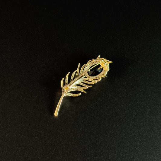Emerald Zircon and Gold Feather Brooch