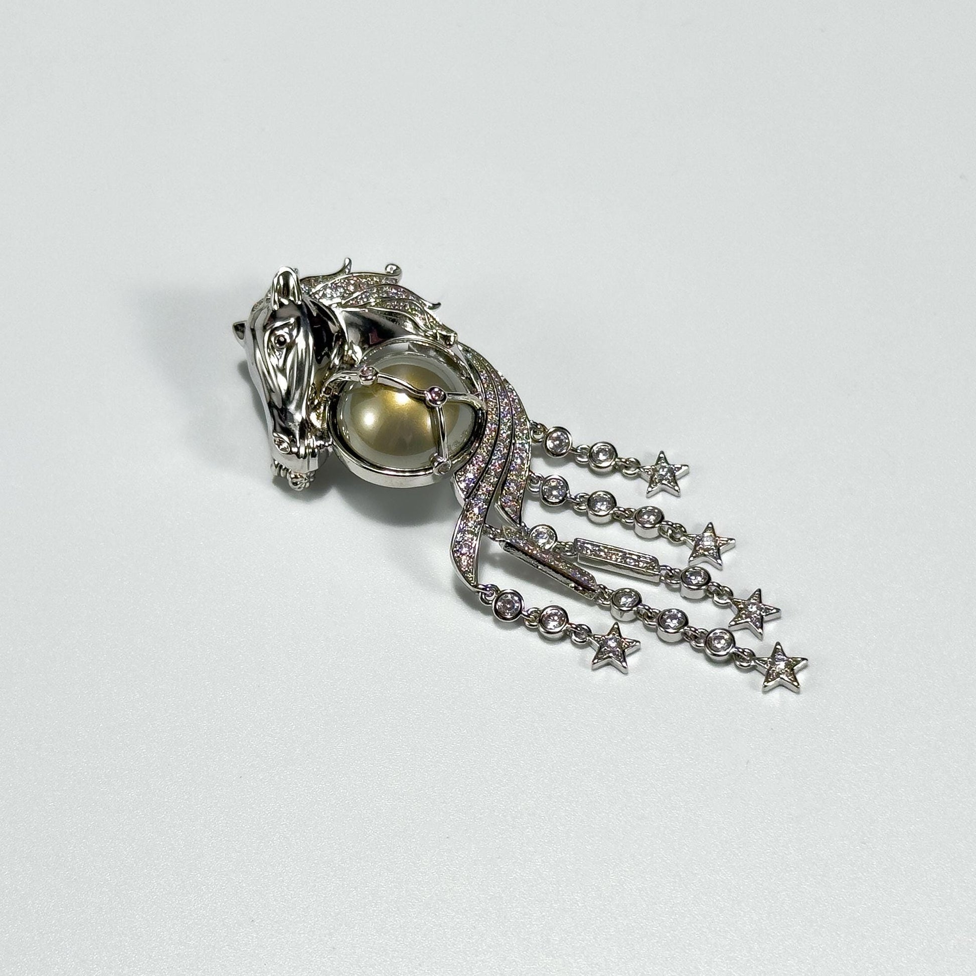 Stylish Horse Head Brooch with Sophisticated Tassel Details