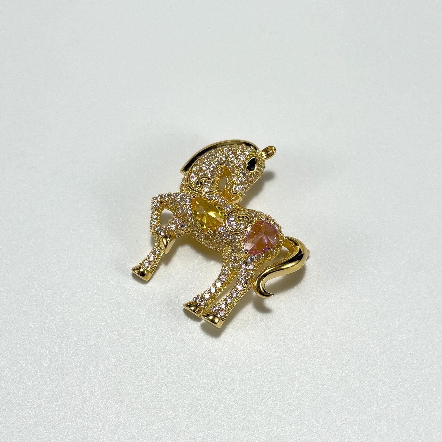 Rhinestone and Gold-Plated Pony Brooch