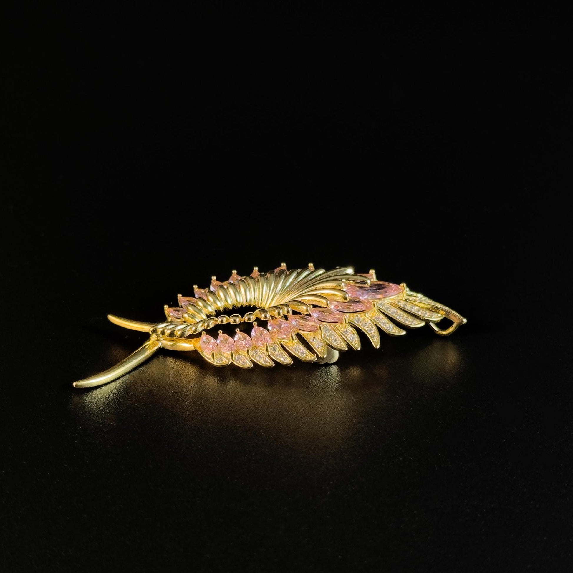 Gold Feather Brooch with Pink Zircon