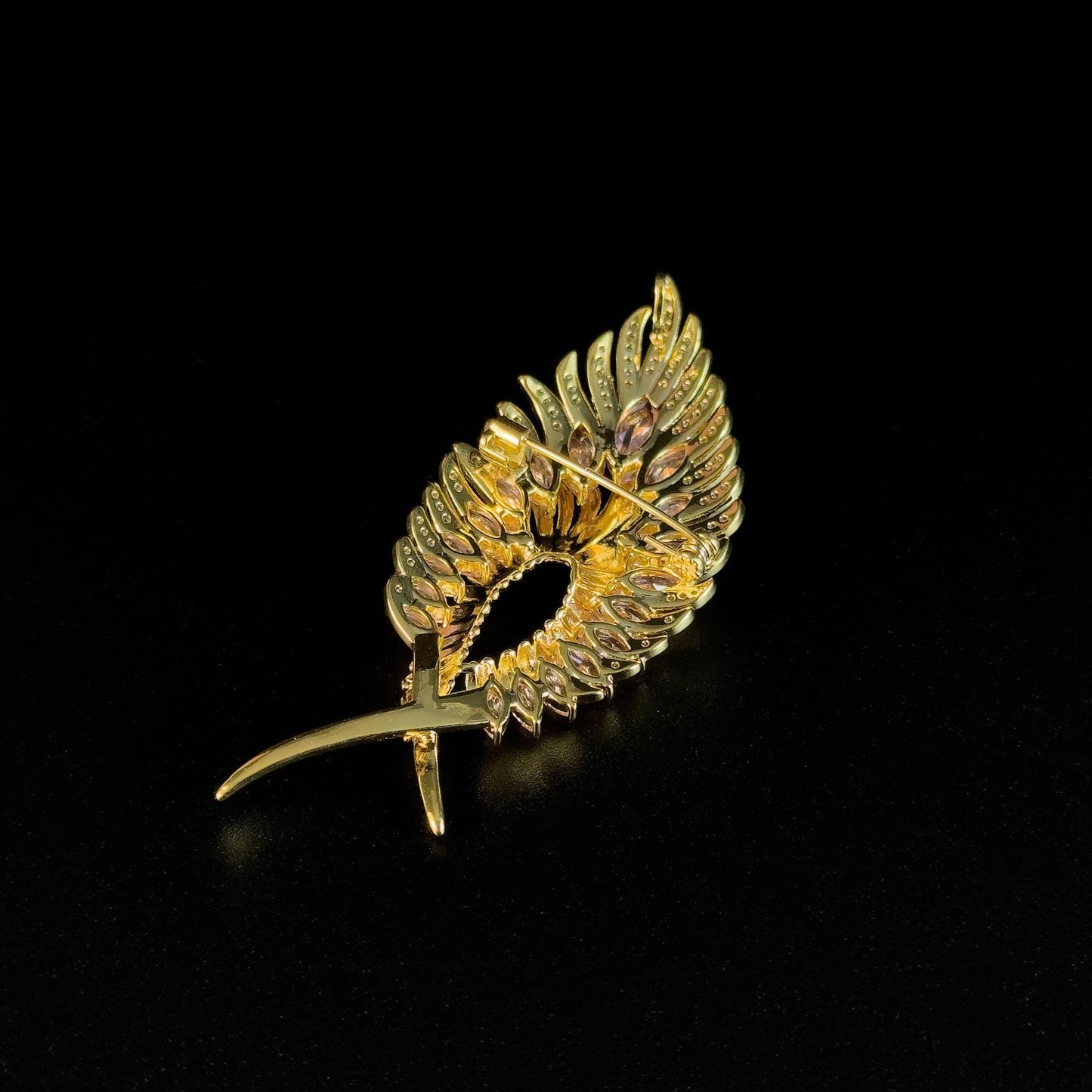 Gold Feather Brooch with Pink Zircon