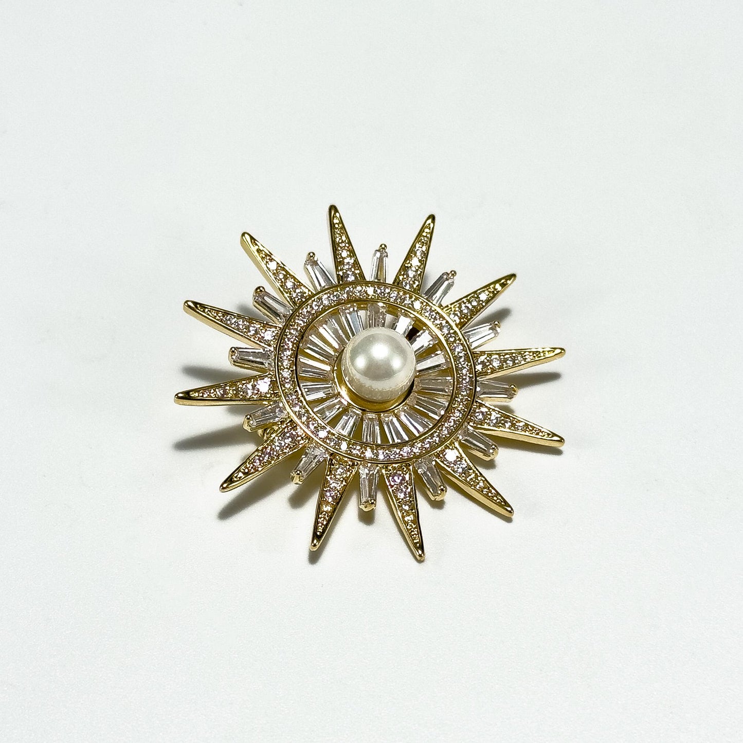 Gold Sun-Shaped Brooch