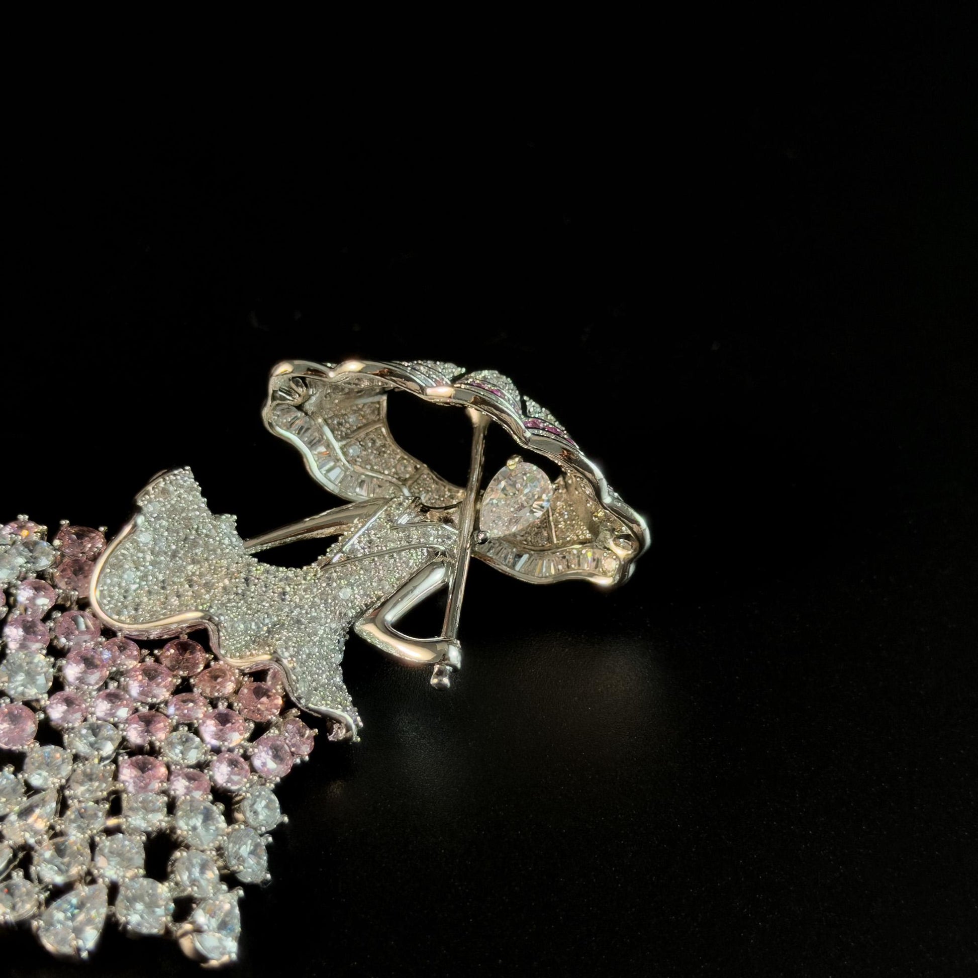 Brooch Featuring a Person Holding an Umbrella