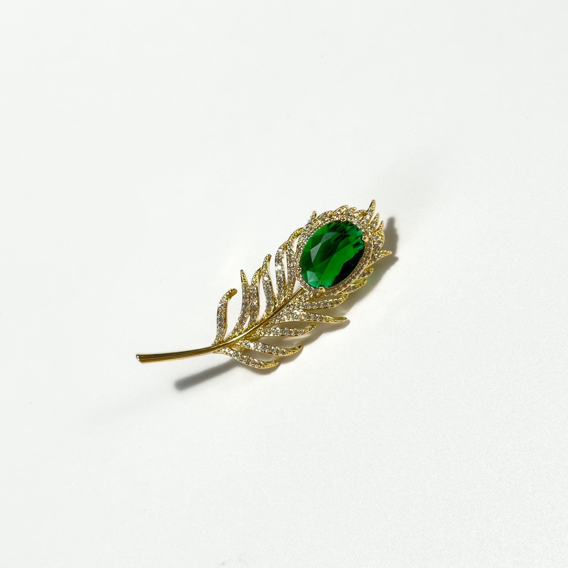 Emerald Zircon and Gold Feather Brooch