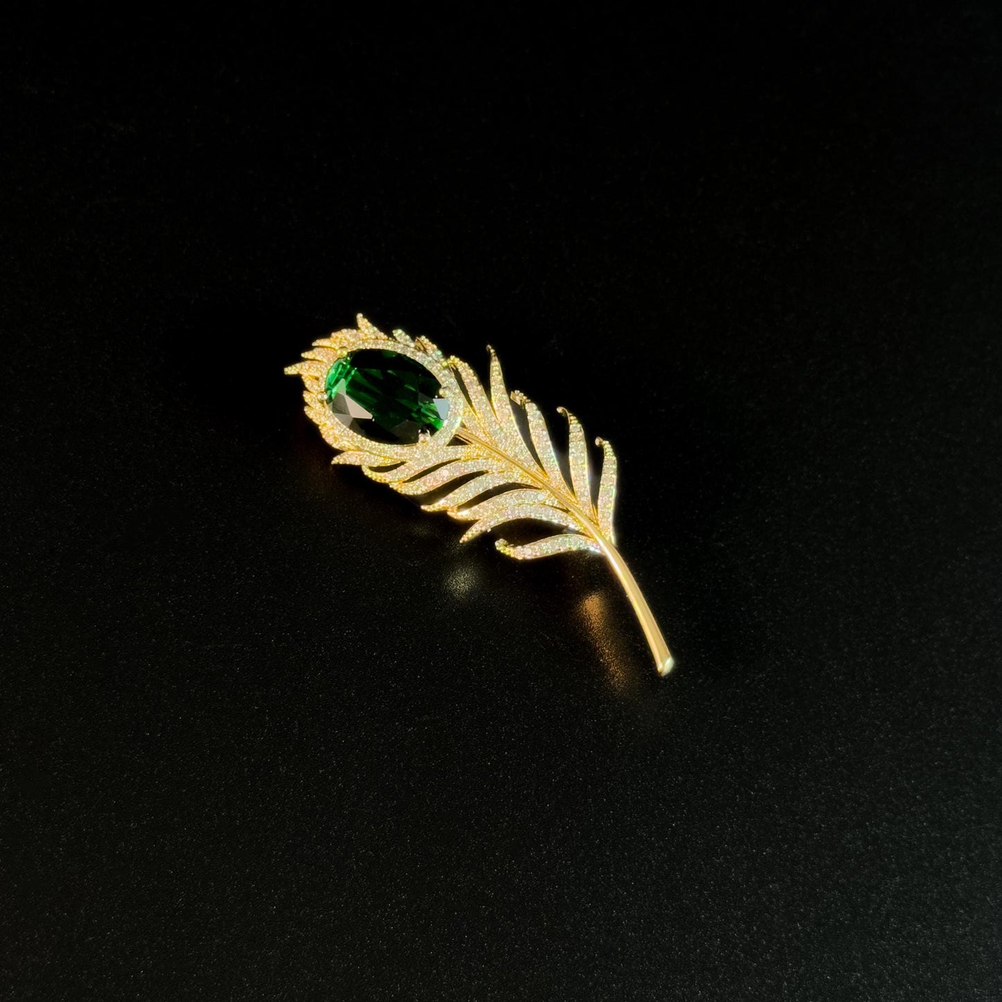 Emerald Zircon and Gold Feather Brooch