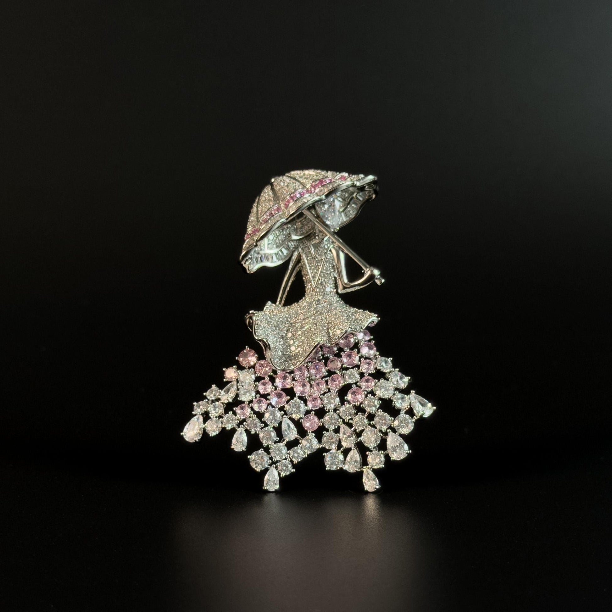 Brooch Featuring a Person Holding an Umbrella