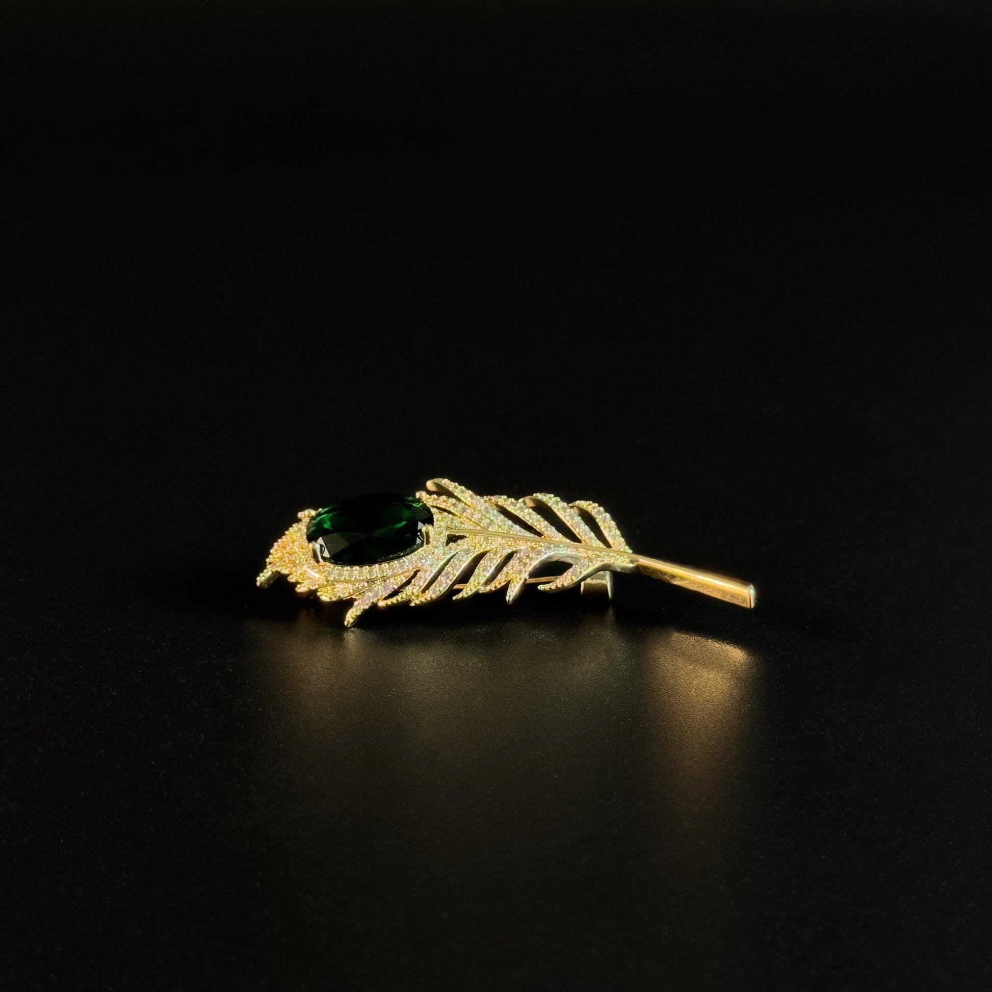 Emerald Zircon and Gold Feather Brooch