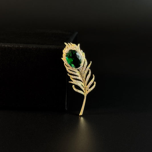 Emerald Zircon and Gold Feather Brooch