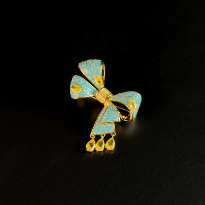 Antigone · Azure Bow Pendant Brooch