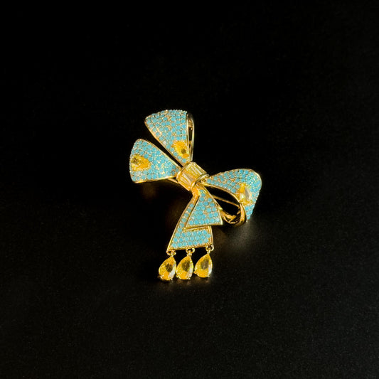 Antigone · Azure Bow Pendant Brooch