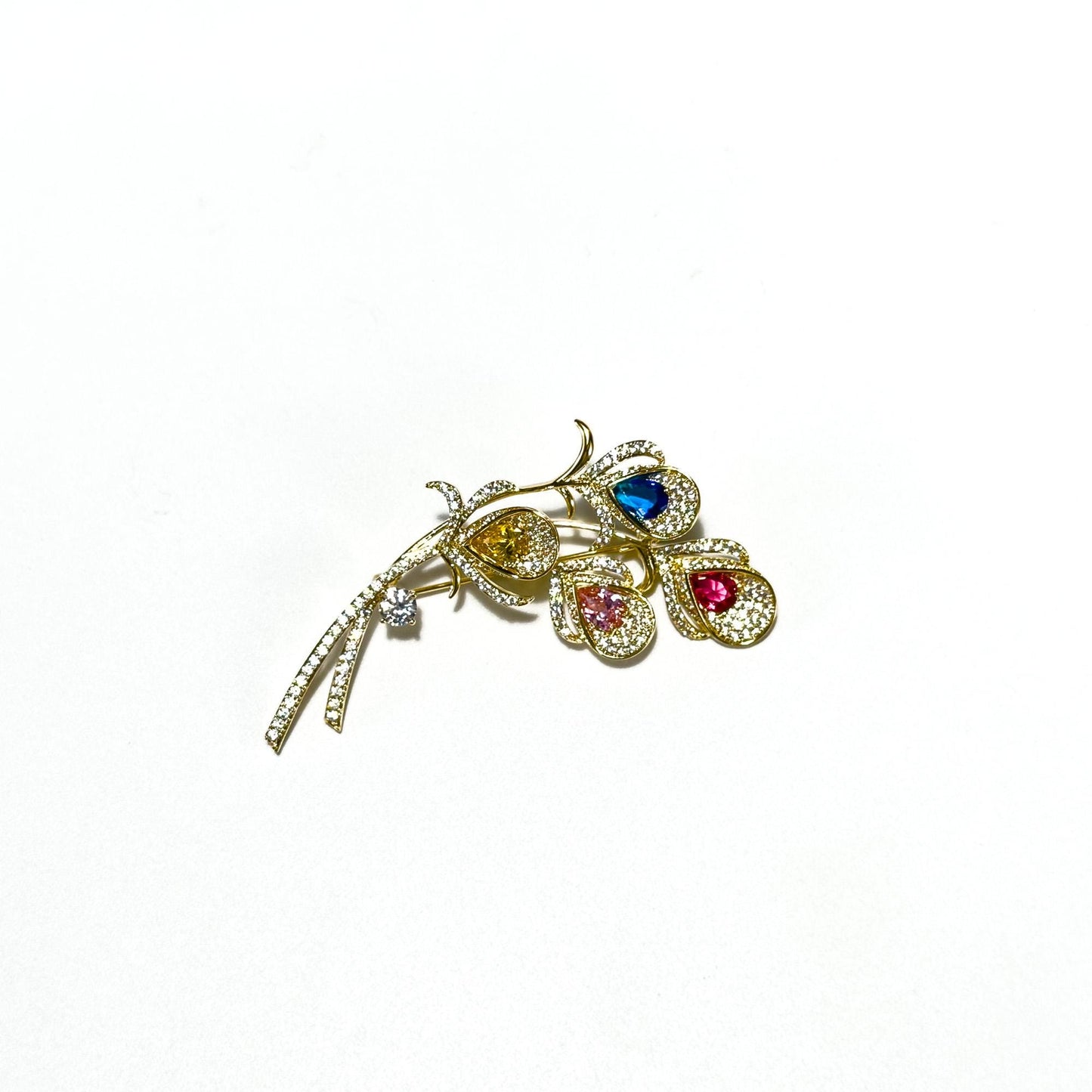 Alope · Golden Peacock Feather Brooch