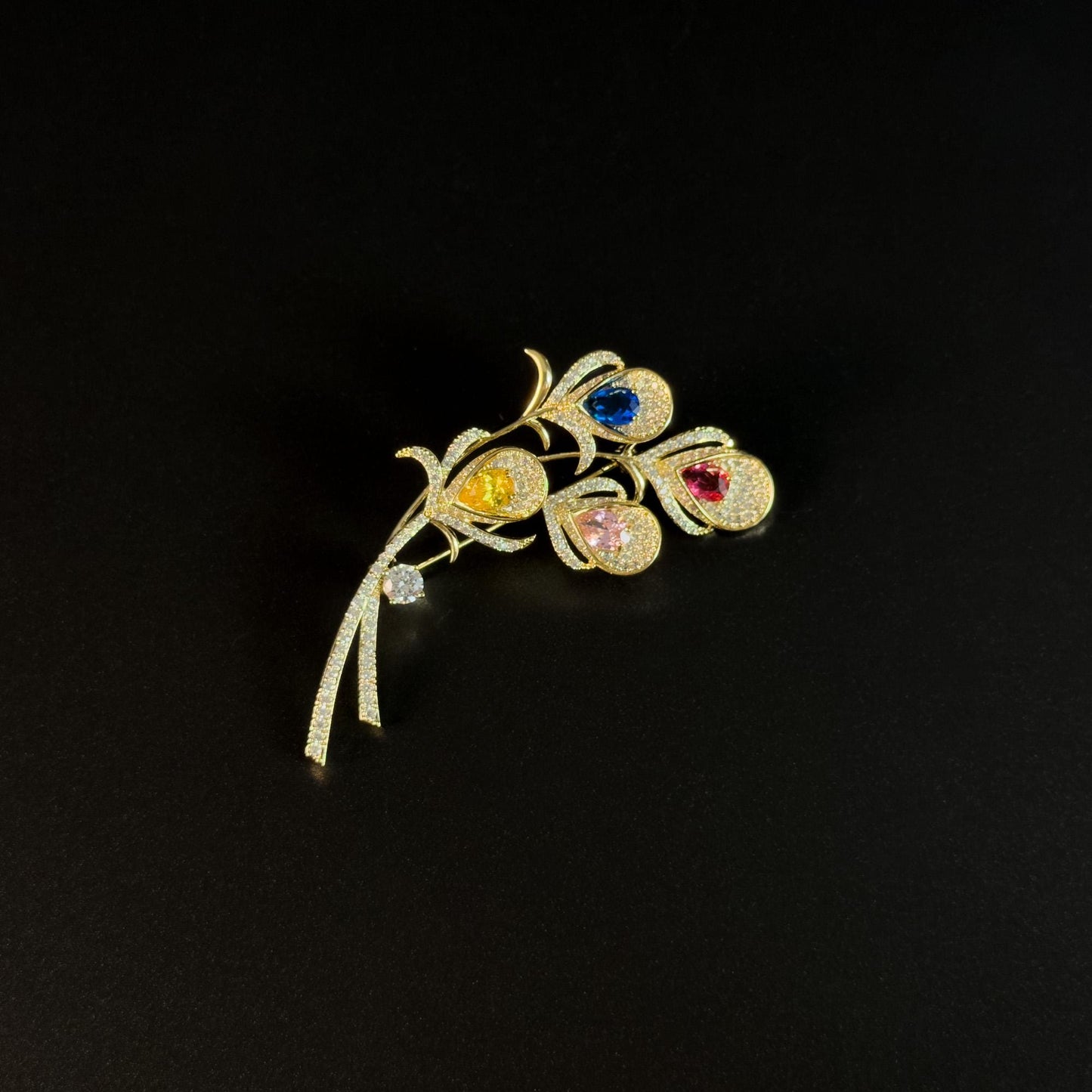 Alope · Golden Peacock Feather Brooch