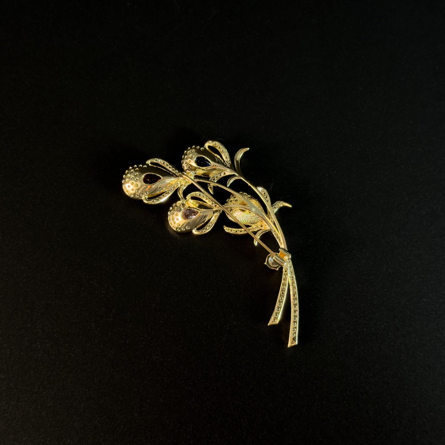Alope · Golden Peacock Feather Brooch