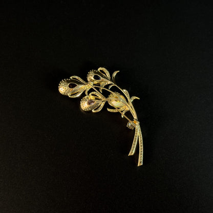 Alope · Golden Peacock Feather Brooch