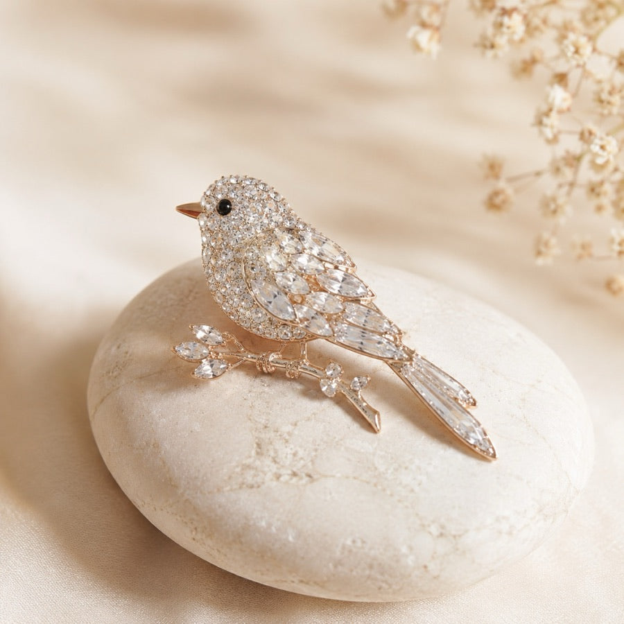 Animal motif brooches on silk
