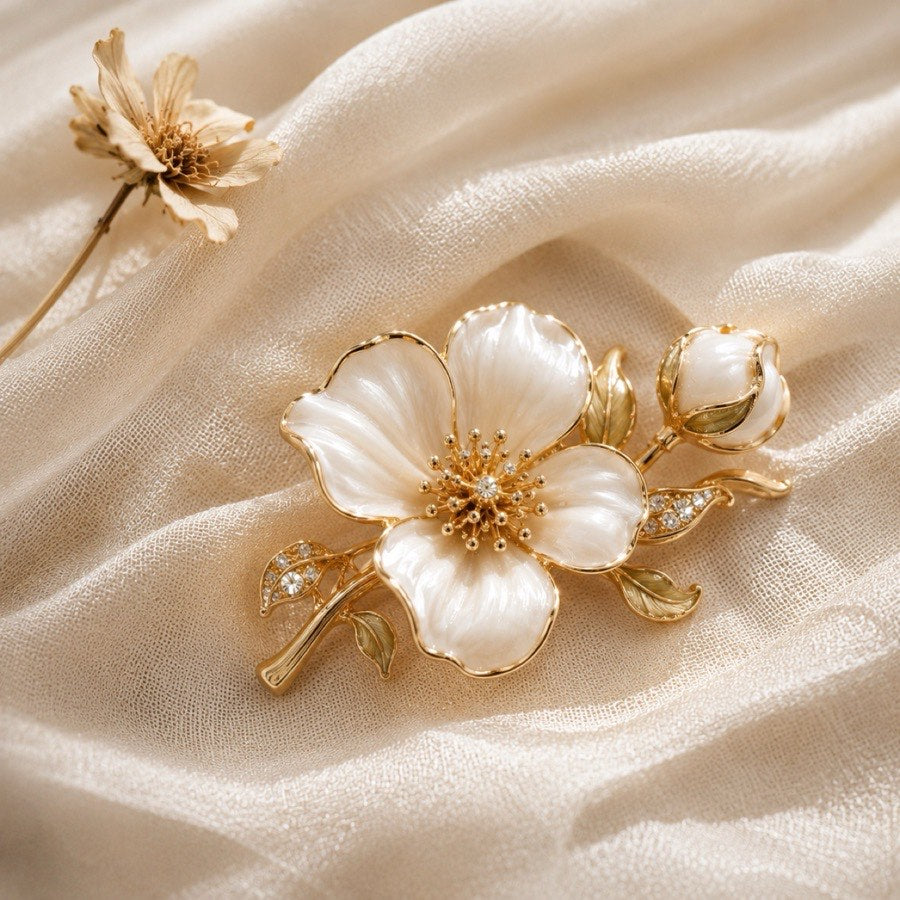Floral and botanical brooches on silk